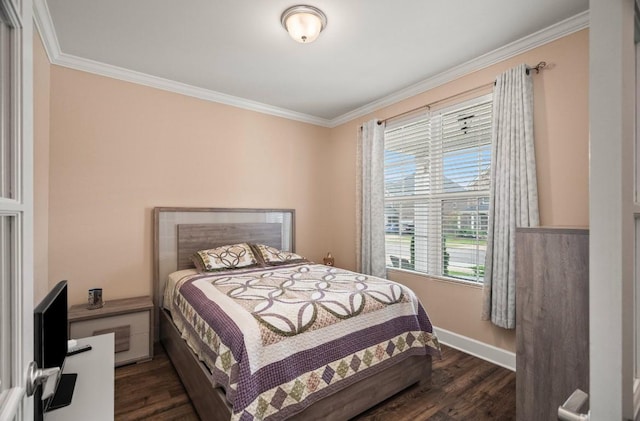 bedroom featuring ornamental molding and dark hardwood / wood-style floors