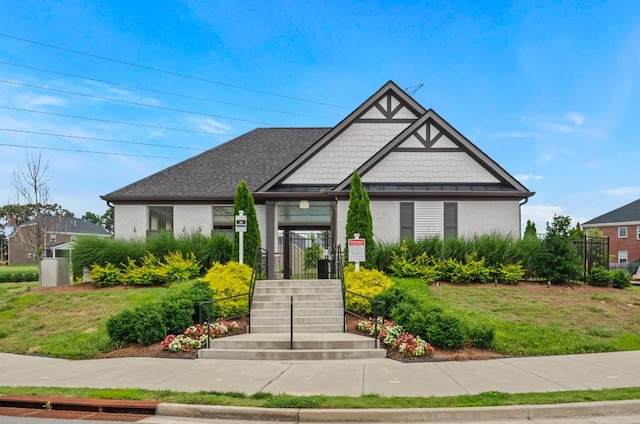 view of front of home with a front lawn