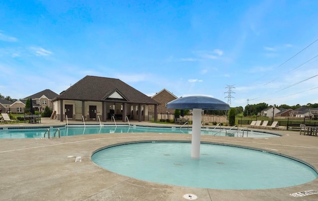 view of swimming pool featuring a patio