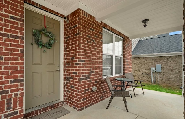 doorway to property with a porch