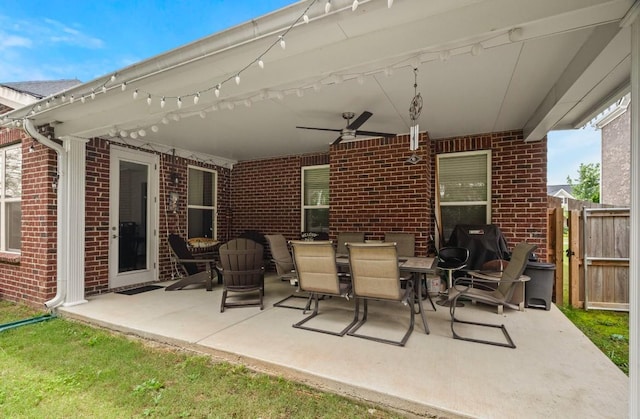 view of patio / terrace featuring ceiling fan