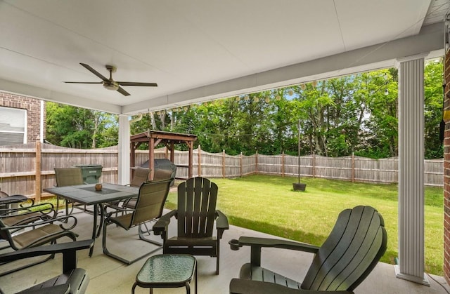 view of patio / terrace with a gazebo and ceiling fan