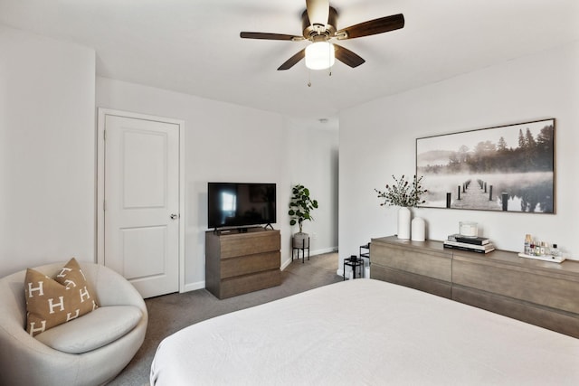 bedroom featuring ceiling fan and dark colored carpet