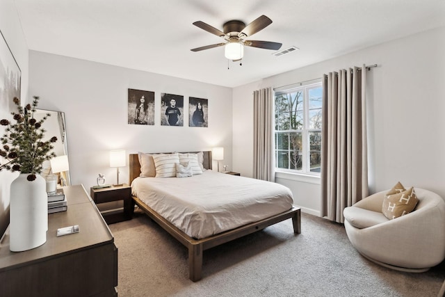 carpeted bedroom with ceiling fan