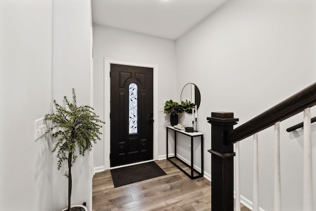 entrance foyer featuring hardwood / wood-style flooring