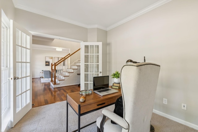 carpeted office space with french doors and ornamental molding