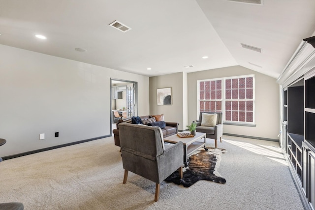 living room featuring light carpet and vaulted ceiling