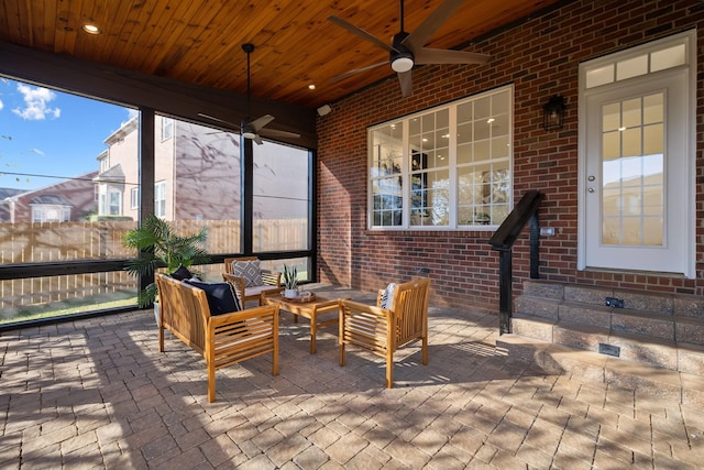 view of patio / terrace with an outdoor living space and ceiling fan