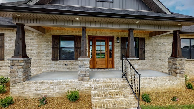 entrance to property with covered porch