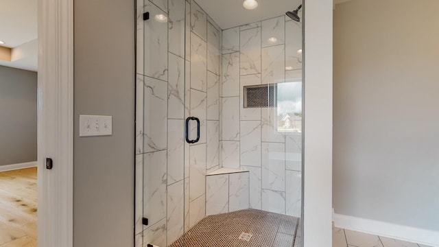 bathroom featuring an enclosed shower