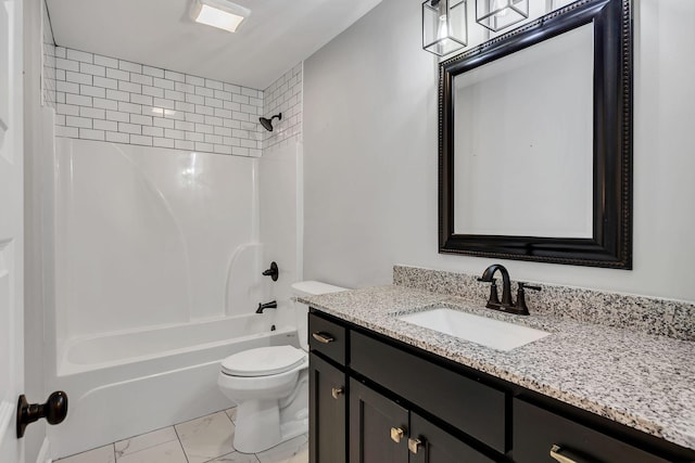 bathroom with shower / washtub combination, vanity, and toilet