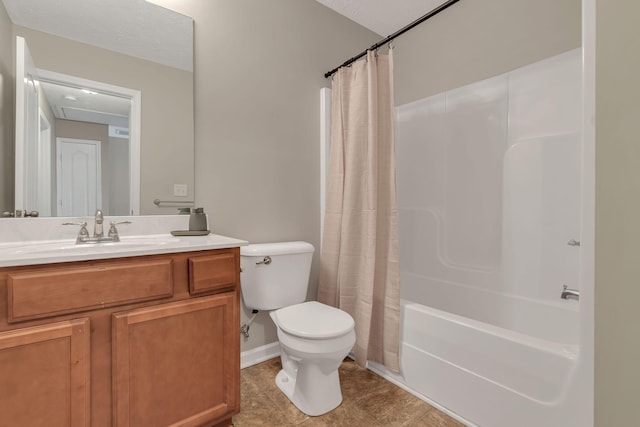 full bathroom with tile patterned flooring, vanity, a textured ceiling, toilet, and shower / bath combo with shower curtain