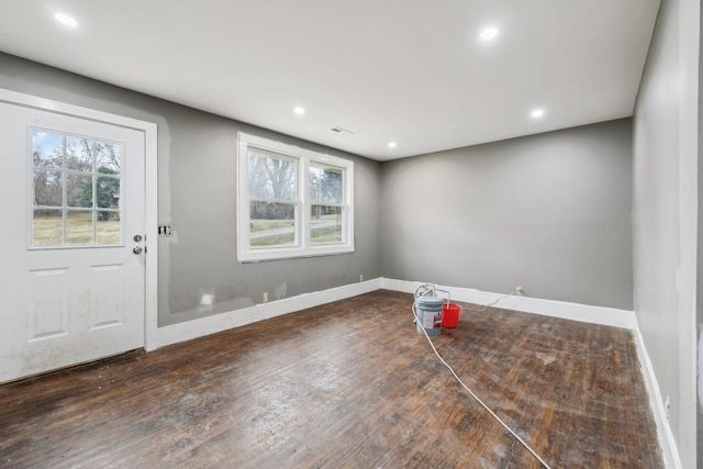 interior space with dark hardwood / wood-style flooring