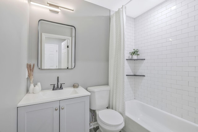 full bathroom featuring vanity, toilet, and shower / bath combo with shower curtain