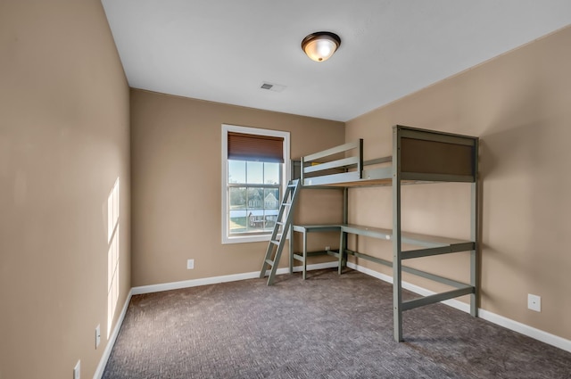 unfurnished bedroom featuring carpet