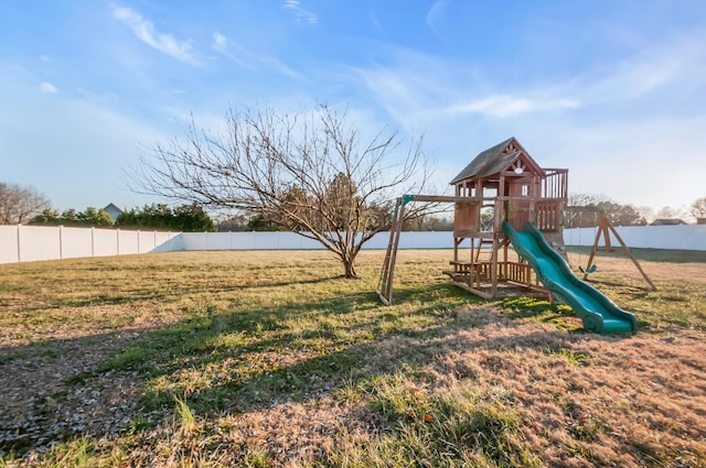 view of play area with a yard