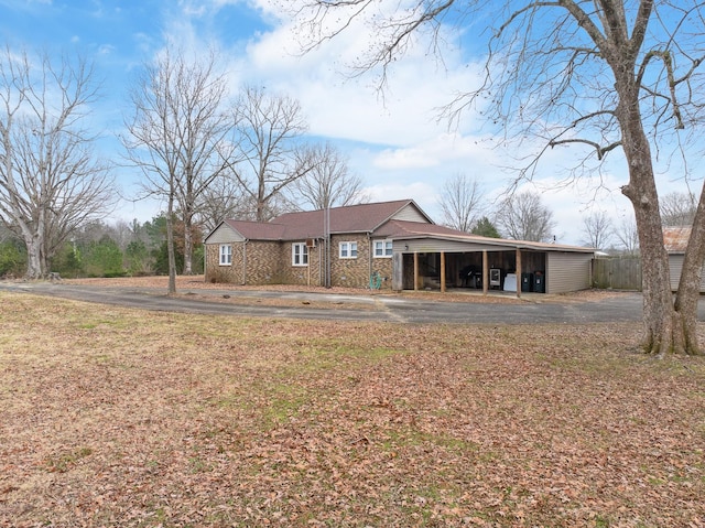 view of front of house featuring a carport