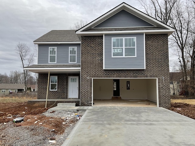 front of property with a garage