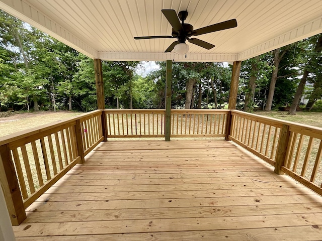 wooden terrace featuring a ceiling fan