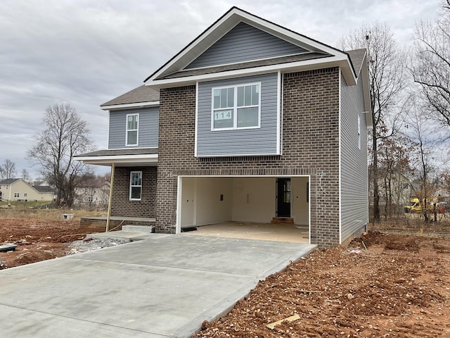 view of front of property with a garage