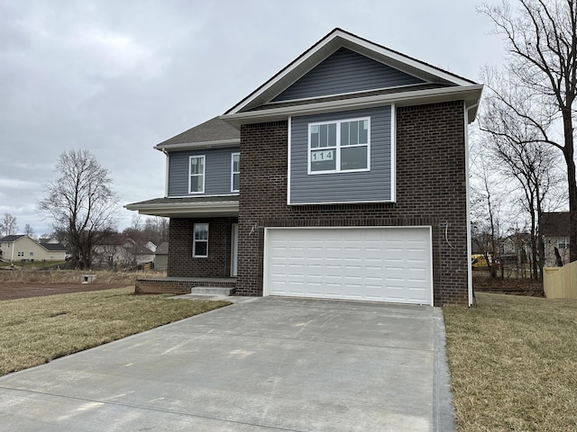 traditional-style house featuring driveway, a garage, a front yard, and brick siding