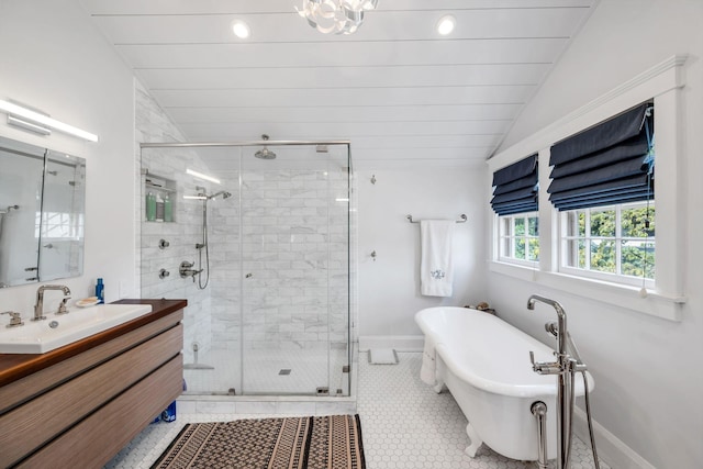 bathroom with tile patterned flooring, plus walk in shower, lofted ceiling, and vanity