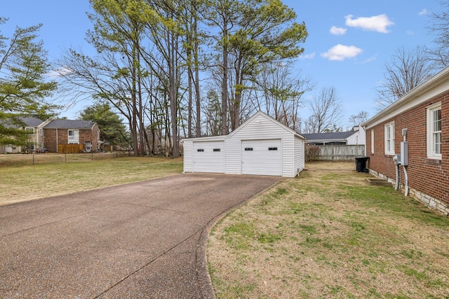 garage with a lawn