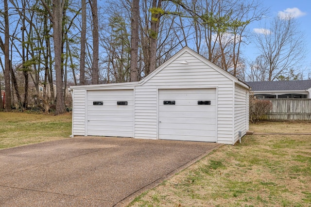 garage with a yard