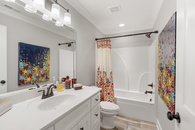 full bathroom featuring vanity, hardwood / wood-style floors, shower / tub combo with curtain, and toilet