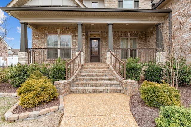 property entrance featuring covered porch