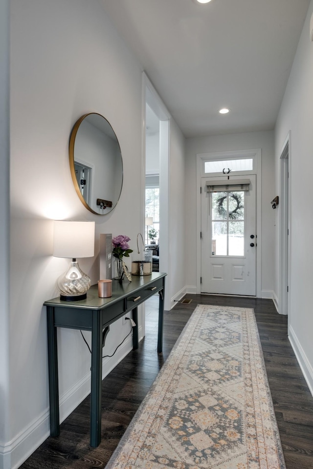 foyer featuring dark hardwood / wood-style floors