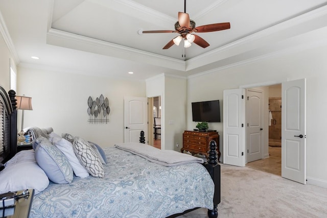 bedroom featuring light carpet, ceiling fan, ornamental molding, and a raised ceiling