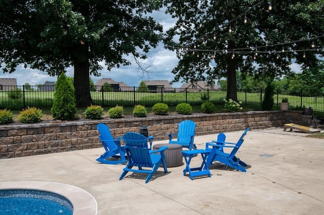 view of patio / terrace featuring fence