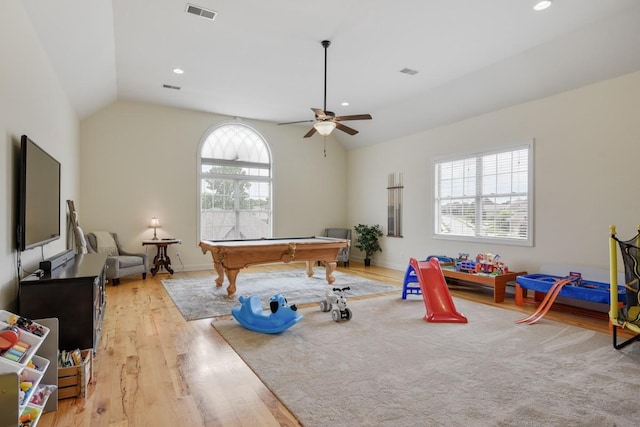 game room featuring ceiling fan, billiards, vaulted ceiling, and light wood-type flooring