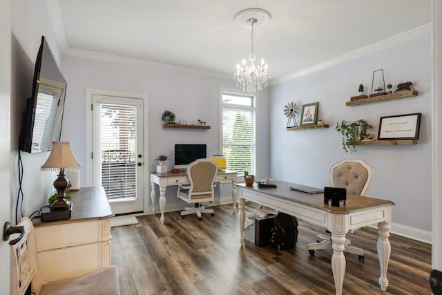 office space featuring dark hardwood / wood-style flooring, ornamental molding, and an inviting chandelier