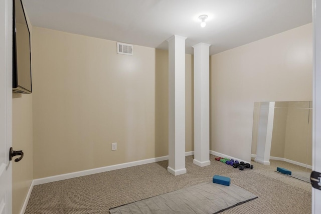 exercise room with baseboards, visible vents, and carpet flooring