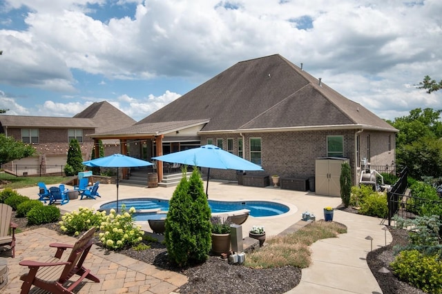 view of swimming pool featuring a patio area