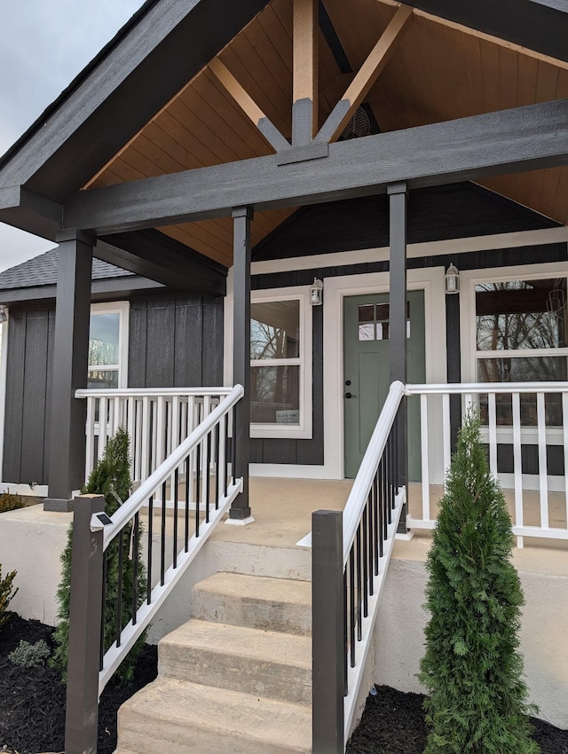 property entrance with covered porch