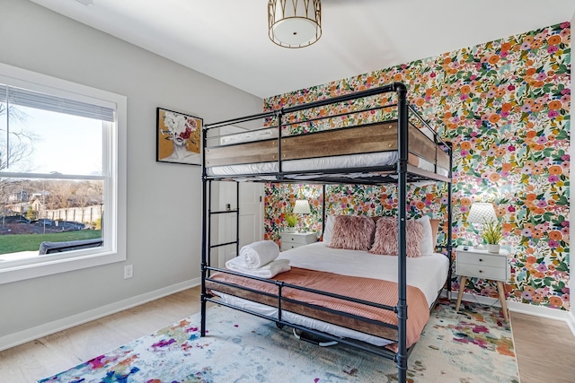 bedroom featuring wood-type flooring