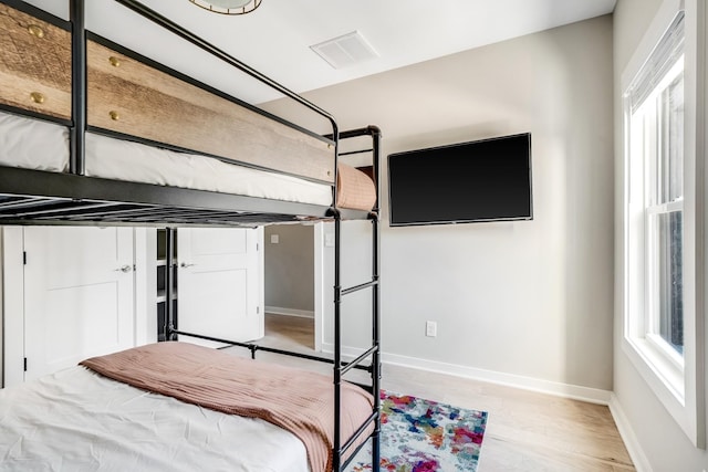 unfurnished bedroom featuring light hardwood / wood-style flooring