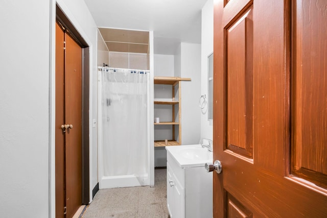 bathroom with vanity and a shower with curtain