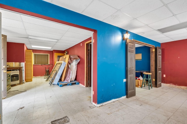 interior space featuring a paneled ceiling