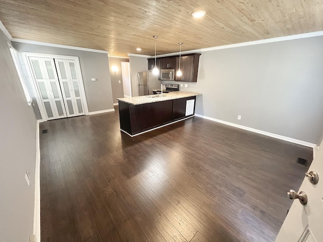 kitchen with dark hardwood / wood-style flooring, light stone countertops, dark brown cabinets, and stainless steel appliances