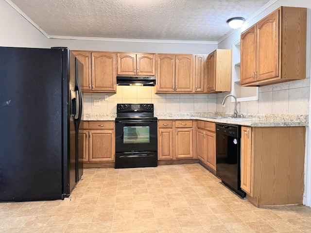 kitchen with tasteful backsplash, sink, black appliances, and a textured ceiling