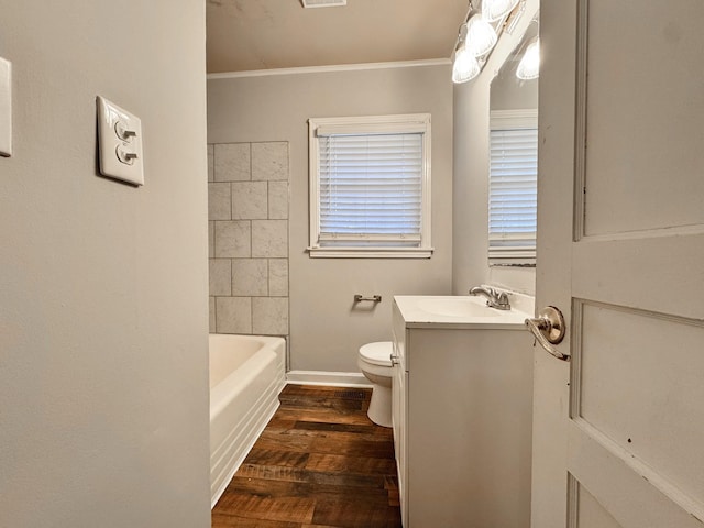 bathroom featuring crown molding, vanity, toilet, and wood-type flooring