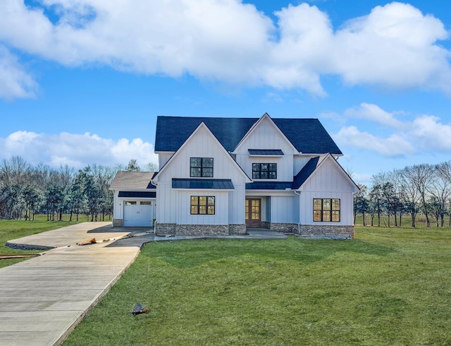 modern farmhouse with a garage and a front lawn