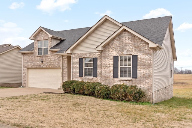 view of front of house featuring a garage and a front lawn