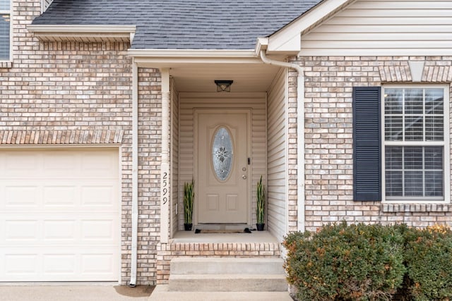 entrance to property with a garage