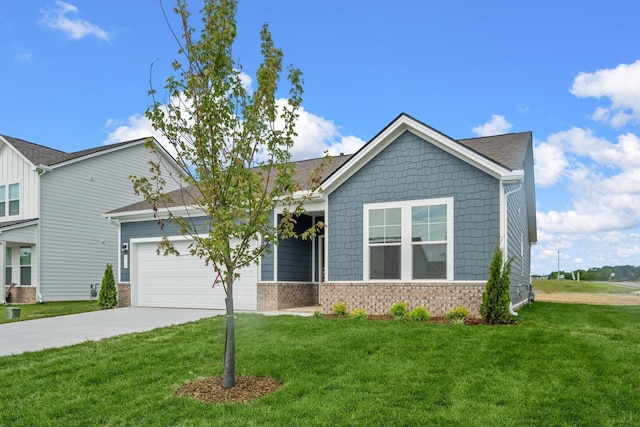 view of front of house with a garage and a front lawn