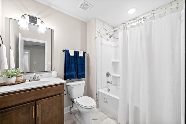 full bathroom featuring vanity, shower / bath combination with curtain, and toilet